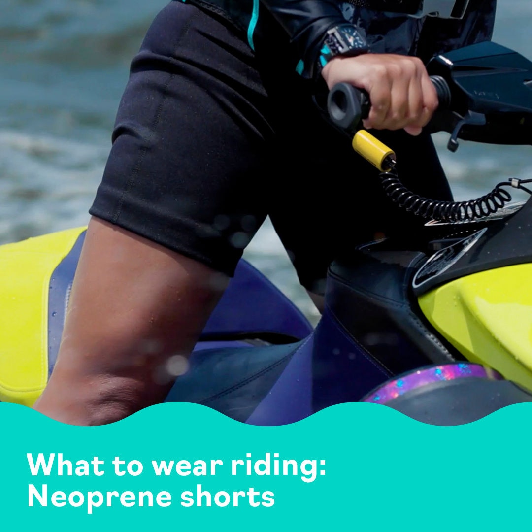 Women wearing neoprene shorts on a PWC