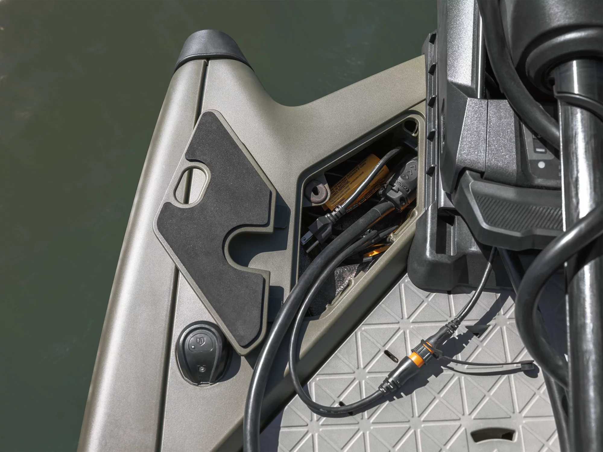 Person adding XPS oil in a Sea-Doo Switch Pontoon